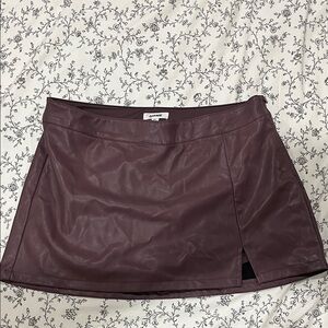 Garage Faux Leather Mini Skirt in Plum